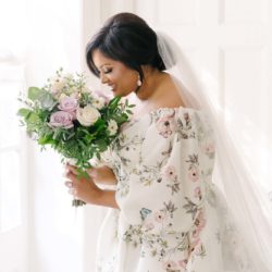 Bride smelling bridal bouquet | Toronto Bridal Hair and Makeup