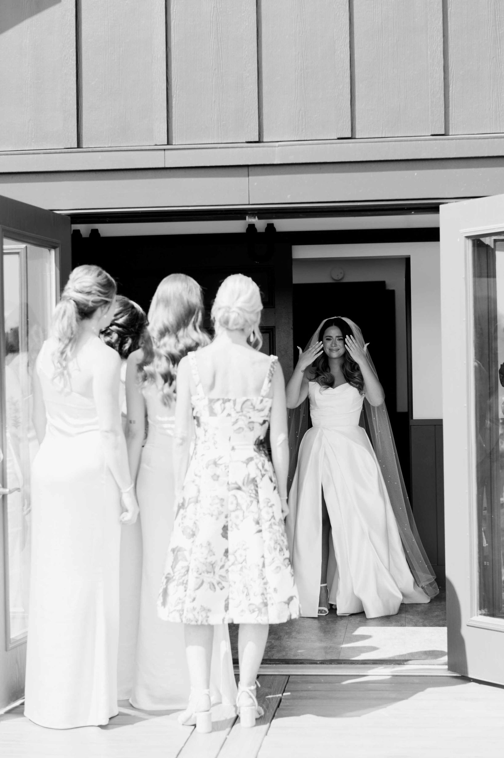 Hannah crying with her bridal party
